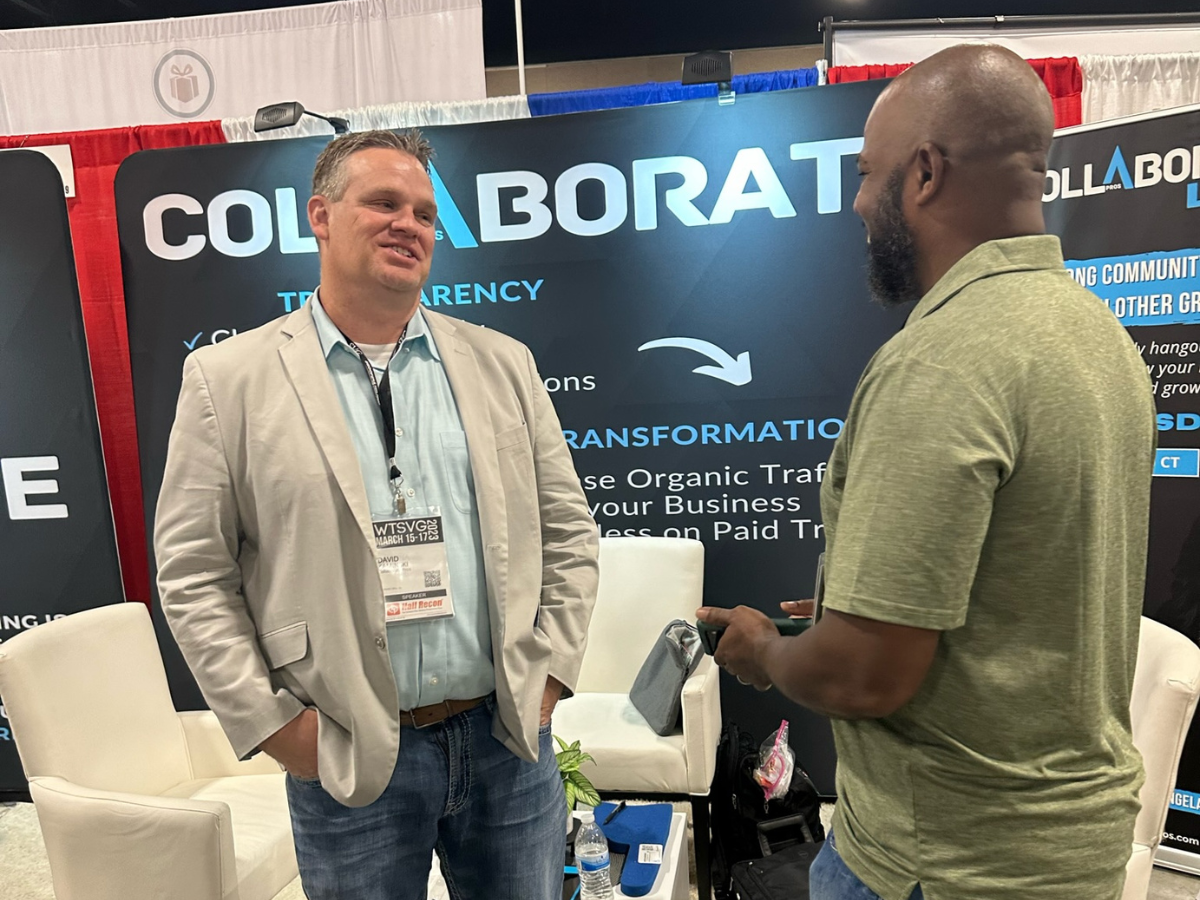 David Kaminski with a client at a Collaborate event - collaborate pros